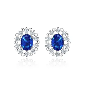 Opulence Sapphire Radiance Oval Cut Halo Earring